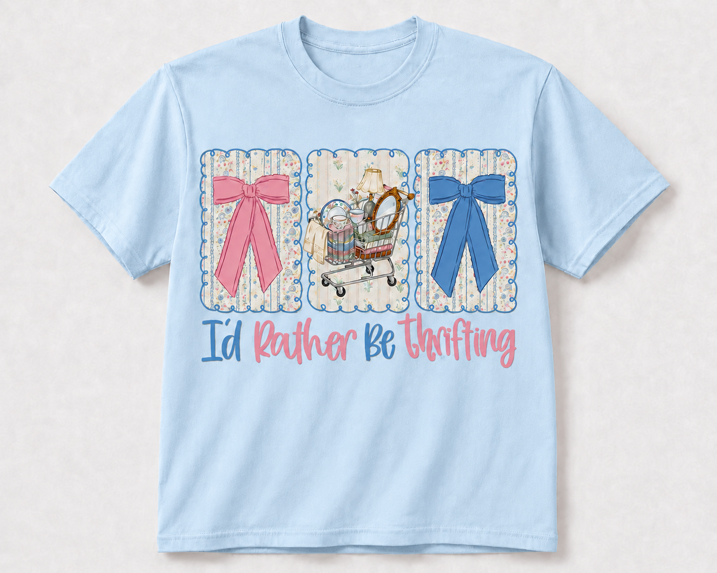 I'd Rather Be Thrifting glitter print tee in light blue mist — pink and blue bows with thrift cart graphic
